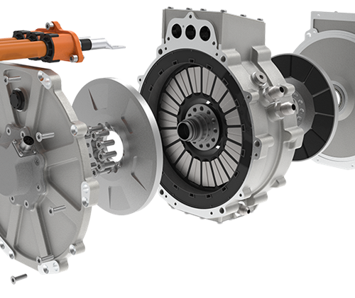 Exploded View Of A Traxial Motor Highlighting Its Innovative Design Optimized For Manufacturing And Assembly. The Image Showcases Various Components Disassembled, Including The Housing, Clutch, Gears, And The Central Electric Motor With Its Orange Power Cable. Each Part Is Meticulously Crafted To Streamline Production And Simplify The Assembly Process, Reflecting The Advanced Engineering Efforts By Traxial To Enhance Efficiency And Functionality.